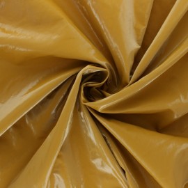 Tissu vinyl froissé brillant - ocre x 10cm